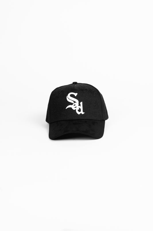 Black cap with a white logo on a white background